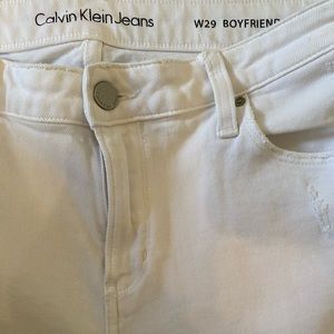 White slightly distressed Calvin Klein Jeans